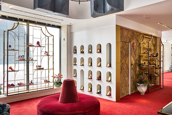 Christian Louboutin with unique store design surrounded by bark
